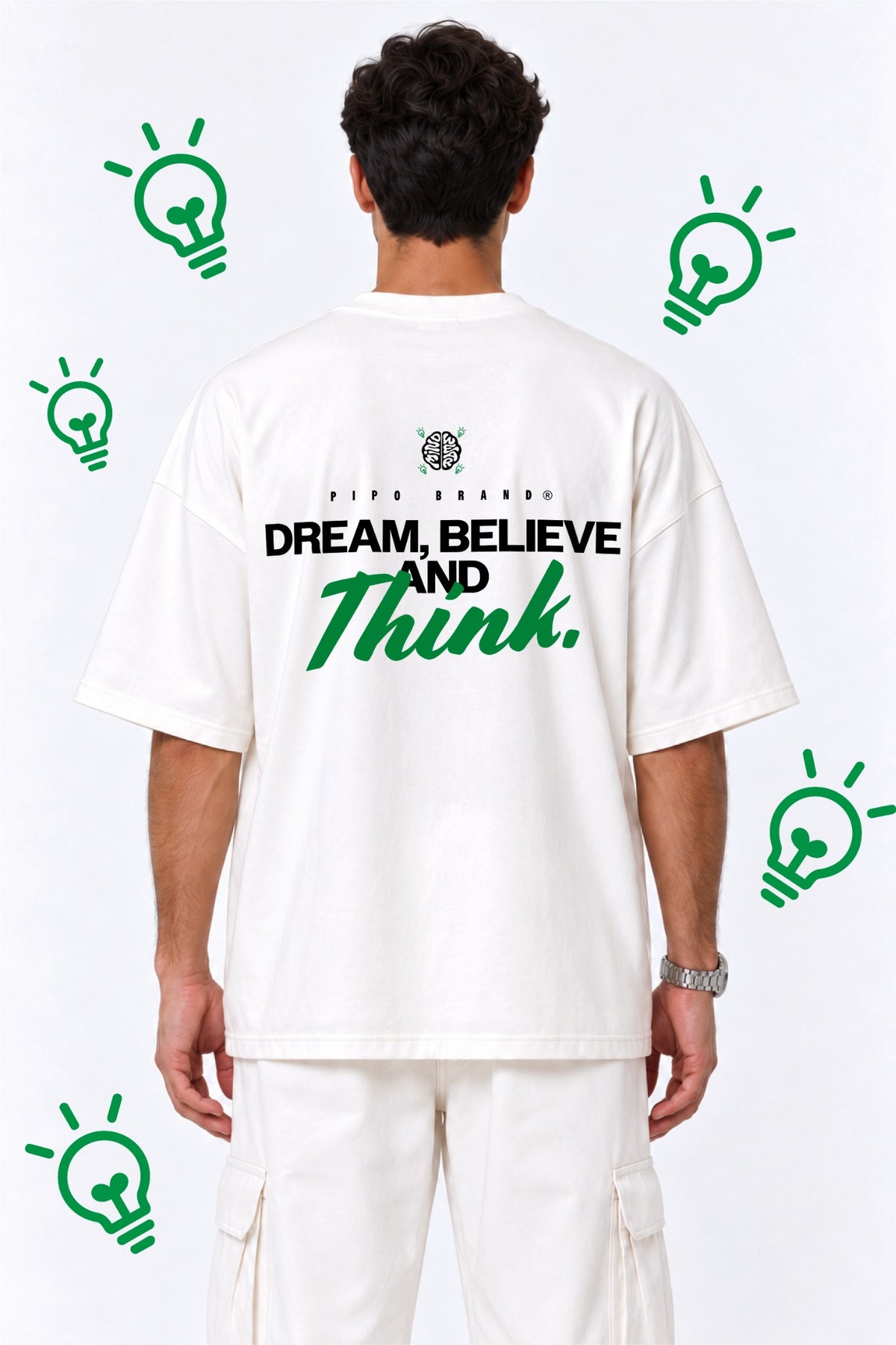 T-shirt Mindwear Dream Believe and Think porté de dos, message DREAM BELIEVE AND Think en noir et vert.