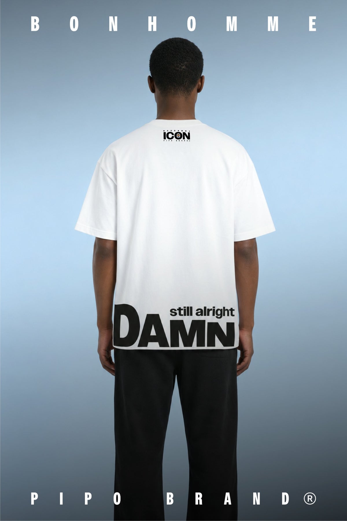 Vue de dos du T-shirt Damn Alright : logo ICON en haut et message DAMN still alright au bas du dos.